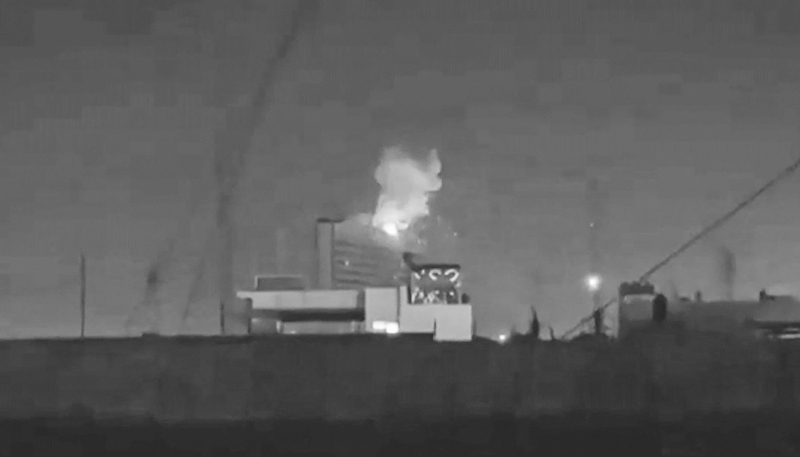 Screenshot of images posted on social media on 16 March 2026 showing a fire on the roof of the Royal Tulip Al Rasheed Hotel in Baghdad.