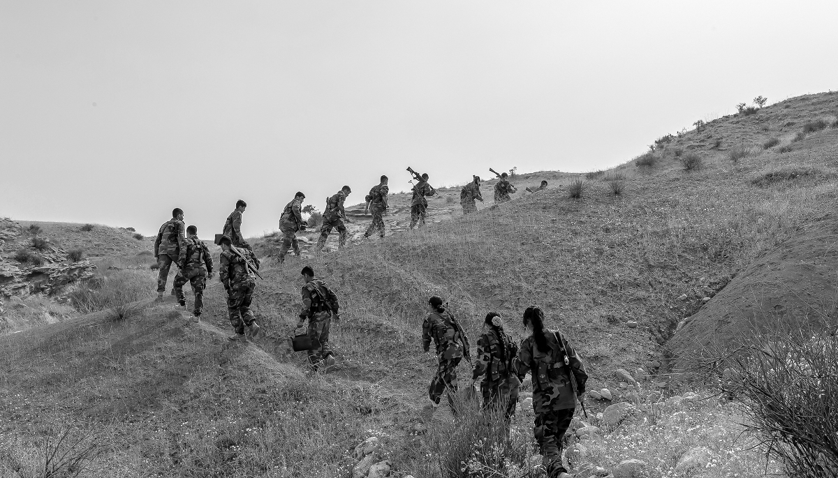 Members of the Kurdistan Democratic Party of Iran (KDPI) taking part in a military drill in an outpost near Erbil, in Iraqi Kurdistan, on 11 June 2023. 