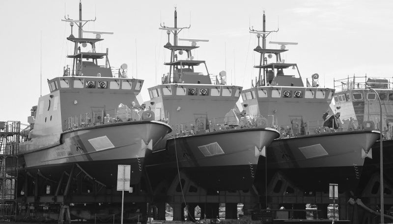 Patrol boats for Saudi Arabia lie on the shipyard grounds belonging to the Lürssen shipyard group, 25 April 2019.