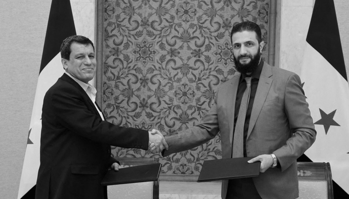 The Syrian Democratic Forces' commander-in-chief Mazloum Abdi (left) with Syria's interim President Ahmed al-Sharaa, in Damascus on 10 March 2025.