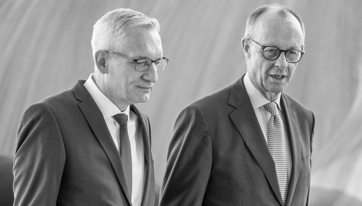 German Chancellor Friedrich Merz (right) and BND chief Martin Jäger in Berlin, on 11 September 2025. 
