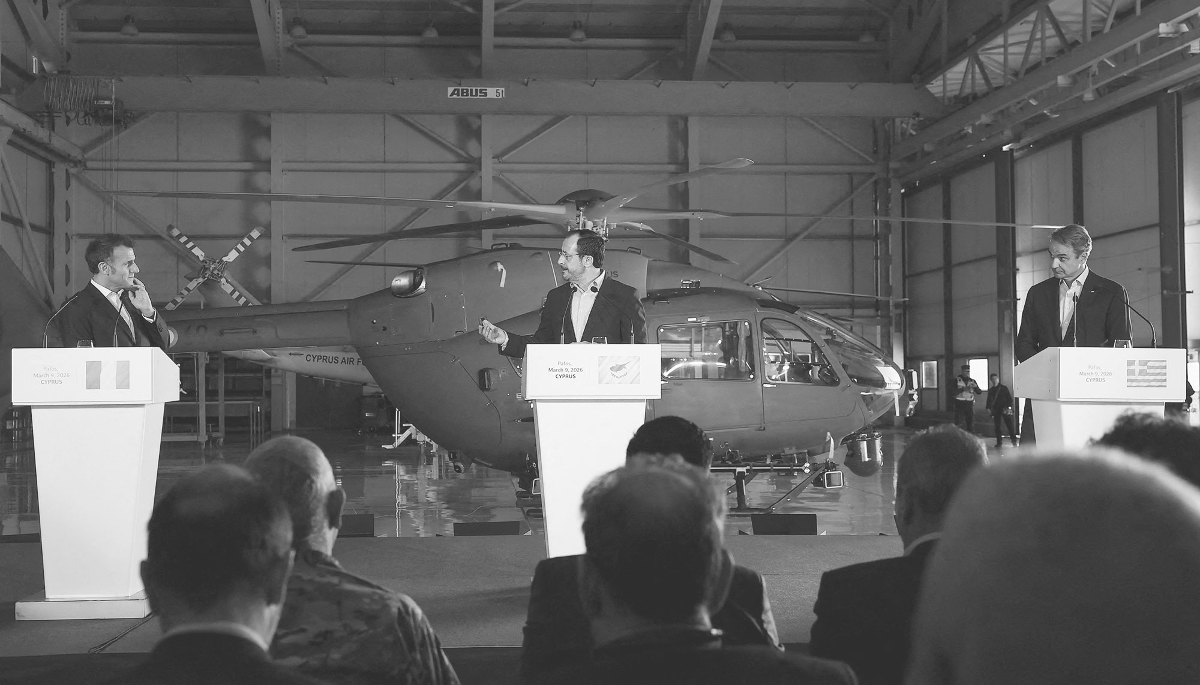 French President Emmanuel Macron (left), his Cypriot counterpart Nikos Christodoulides (centre) and Greek Prime Minister Kyriakos Mitsotakis at Paphos Military Airport in Cyprus on 9 March 2026.