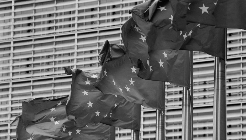 European Union flags flutter outside the EU Commission headquarters in Brussels, 16 July 2025.