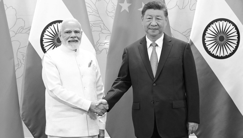 Chinese President Xi Jinping (right) meets with Indian Prime Minister Narendra Modi in Tianjin, northern China, on 31 August 2025.