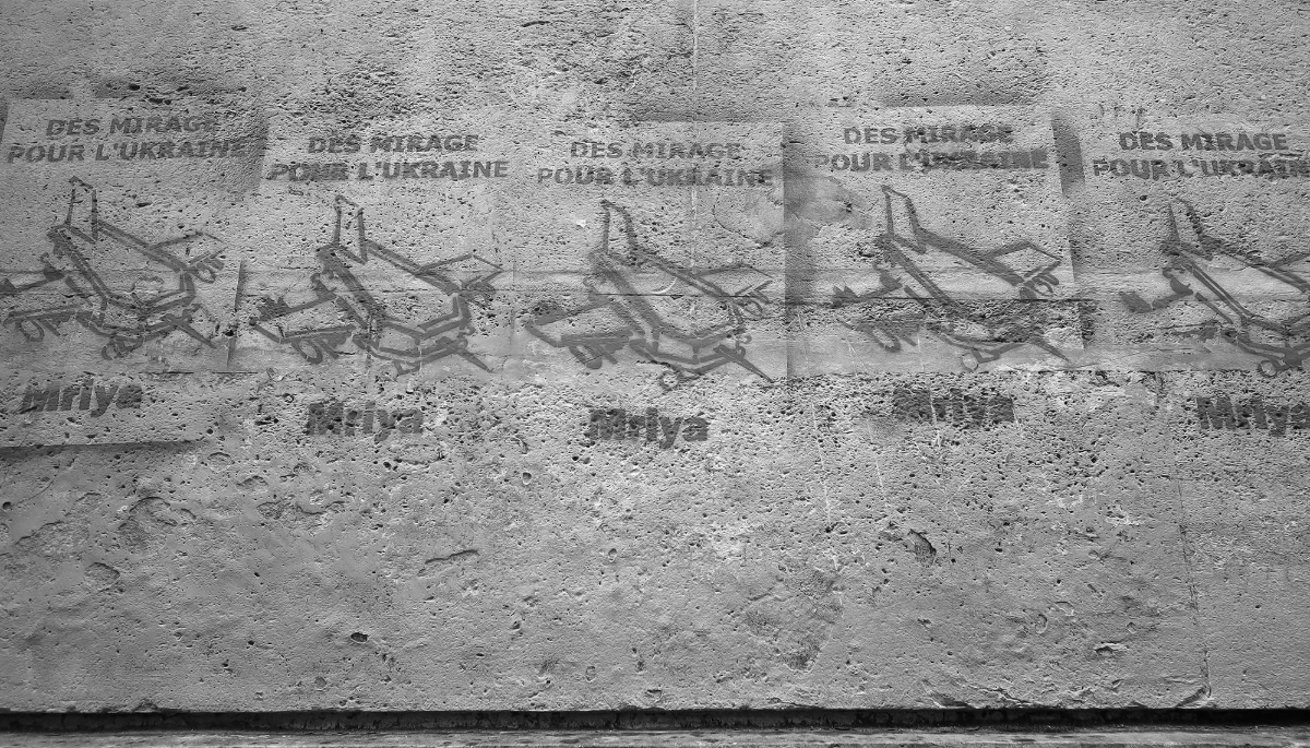 Graffiti showing flying coffins and reading ‘Mirage jets for Ukraine’ in Paris's ninth arrondissement, on 21 June 2024.